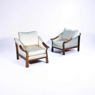 Pierre Chareau Pair of French Art Deco Walnut Lounge Chairs in the Style of Pierre Chareau