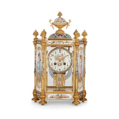 Porcelain champlev enamel and gilt bronze Rococo style three piece clock set