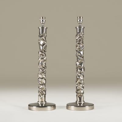 Porta Romana Pair of tall melting metal polished nickel lamps by Porta Romana