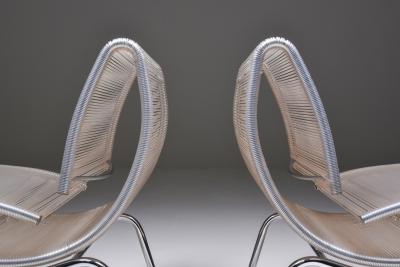 Post modern pair of easy chairs in chrome and plastic wire 1960s