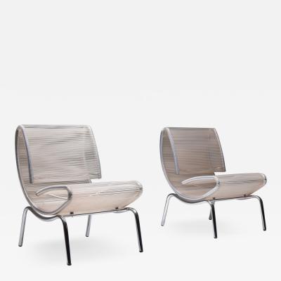 Post modern pair of easy chairs in chrome and plastic wire 1960s