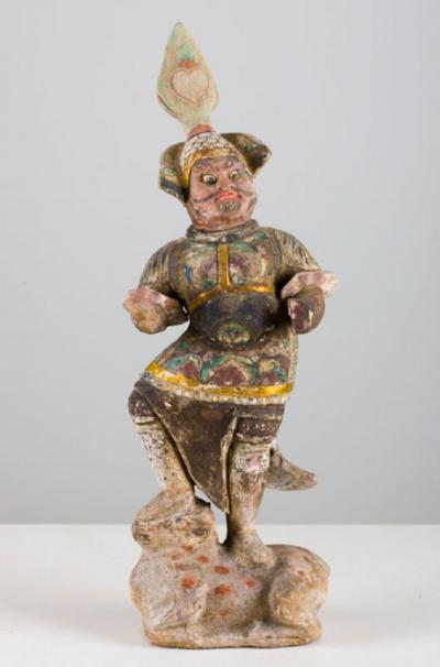 Pottery Figure of a Small Lokapala in Full Armor Astride a Bull