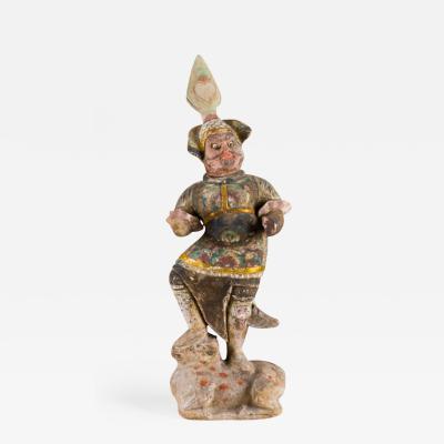 Pottery Figure of a Small Lokapala in Full Armor Astride a Bull