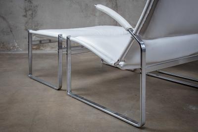 Preben Fabricius PAIR OF FABRICIUS AND KASTHOLM CHAIRS AND OTTOMAN