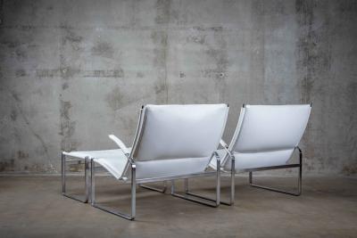 Preben Fabricius PAIR OF FABRICIUS AND KASTHOLM CHAIRS AND OTTOMAN