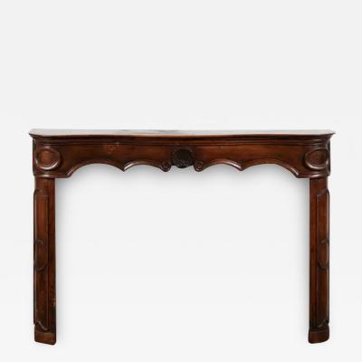 Proven al Louis XV Period 18th Century Walnut Fireplace Mantel with Carved Shell