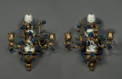 QING DYNASTY TWO LIGHT GILT COPPER MOUNTED PORCELAIN WALL SCONCES