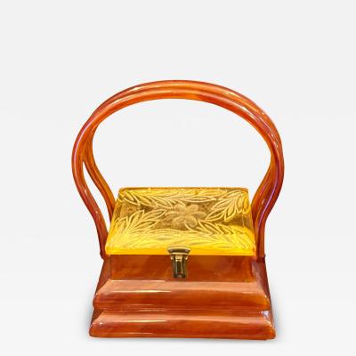 RARE LUCITE PAGODA HANDBAG WITH APPLEJUICE LUCITE CARVED FLORAL LID