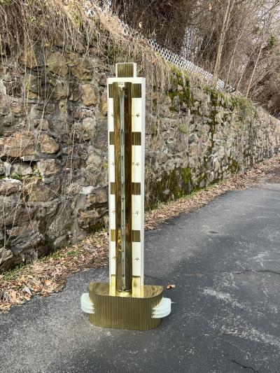 RARE MONUMENTAL POLISHED BRASS AND GLASS ART DECO SCONCES WITH STAR ACCENTS