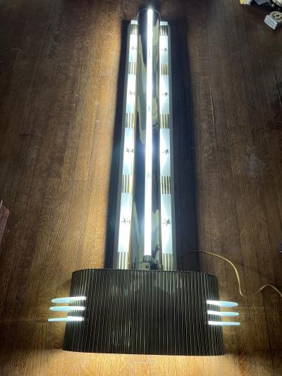 RARE MONUMENTAL POLISHED BRASS AND GLASS ART DECO SCONCES WITH STAR ACCENTS
