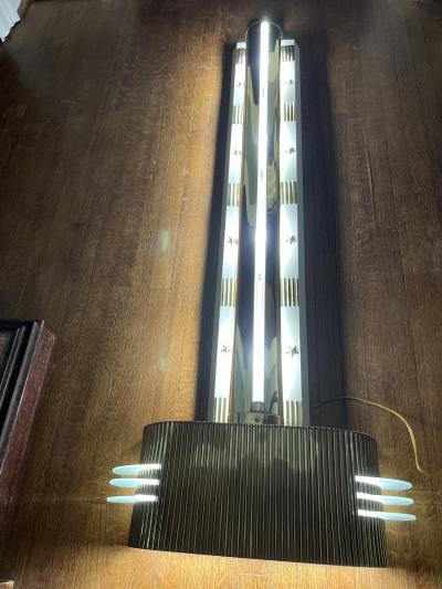 RARE MONUMENTAL POLISHED BRASS AND GLASS ART DECO SCONCES WITH STAR ACCENTS