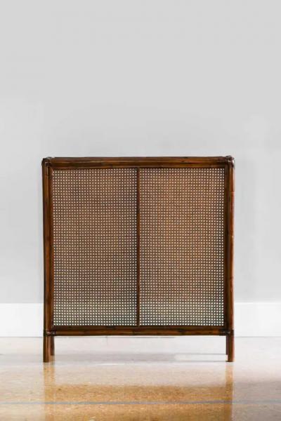 Radiator cover in bamboo and Vienna straw with leather bindings Molto Editions