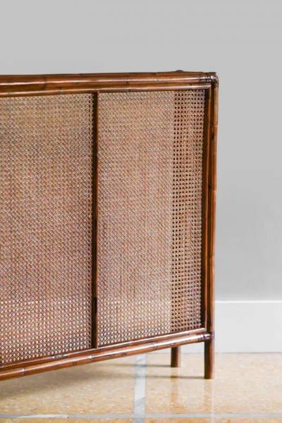 Radiator cover in bamboo and Vienna straw with leather bindings Molto Editions