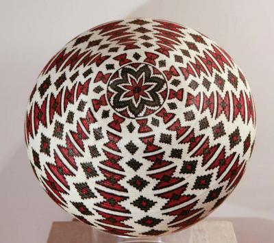 Rain Forest Basket Panama by Ana Cabezon finely woven red green black geometric