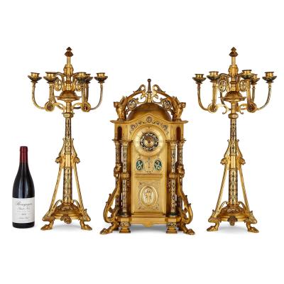 Raingo Fr res Byzantine style gilt bronze and champlev enamel clock garniture