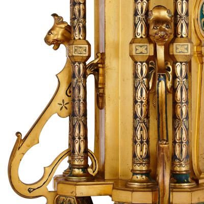 Raingo Fr res Byzantine style gilt bronze and champlev enamel clock garniture