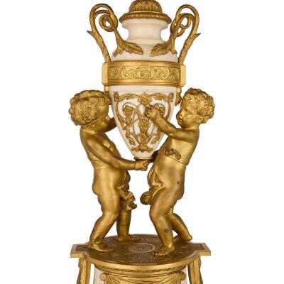 Raingo Fr res Grand ormolu and marble clock set by Raingo Fr res and Salmson