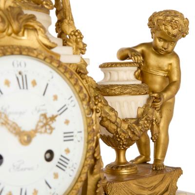 Raingo Fr res Grand ormolu and marble clock set by Raingo Fr res and Salmson