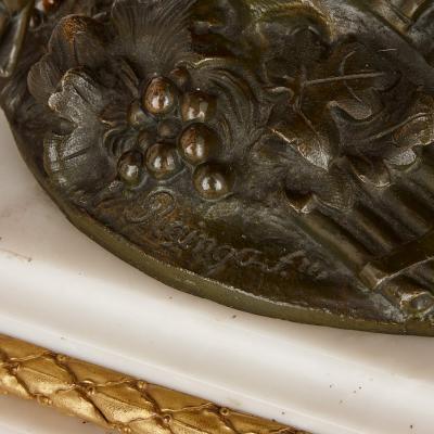 Raingo Fr res Large gilt patinated bronze and marble clock set by Raingo Fr res