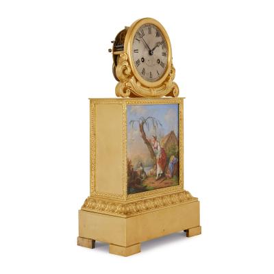 Raingo Fr res Ormolu and porcelain antique mantel clock by Raingo Fr res
