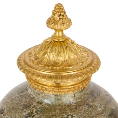 Raingo Fr res Pair of Empire style marble and ormolu vases by Raingo