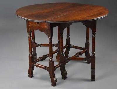 Rare 18thc red walnut gateleg table of small proportions fine patina