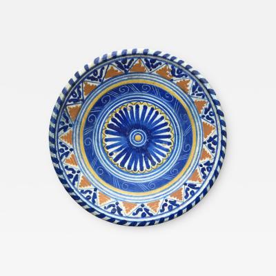 Rare Dutch Maiolica plate with stylized flower early 17th centruy