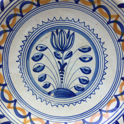 Rare Dutch Maiolica plate with tulip early 17th century