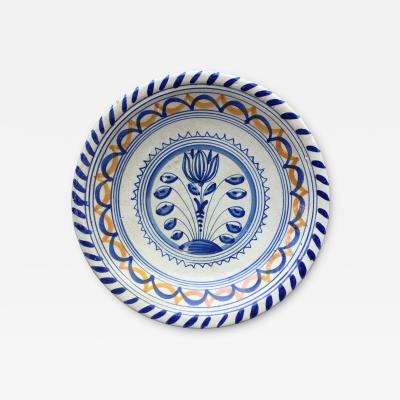 Rare Dutch Maiolica plate with tulip early 17th century