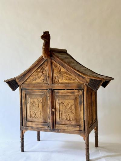 Rare and primitive Sumatran 2 Drawer Cabinet with Bird Carvings on all 4 Sides