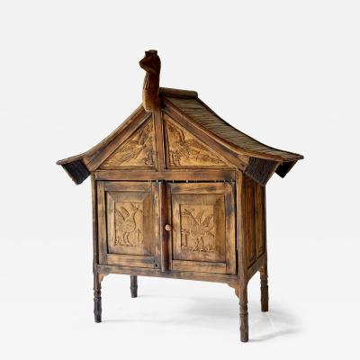 Rare and primitive Sumatran 2 Drawer Cabinet with Bird Carvings on all 4 Sides