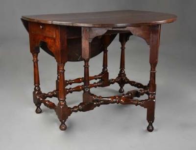 Rare early 18th century walnut gateleg table of fine patina