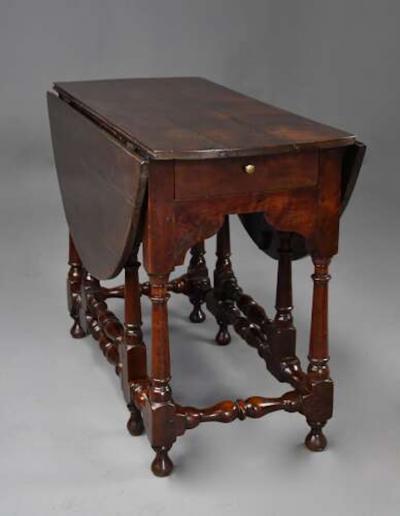 Rare early 18th century walnut gateleg table of fine patina