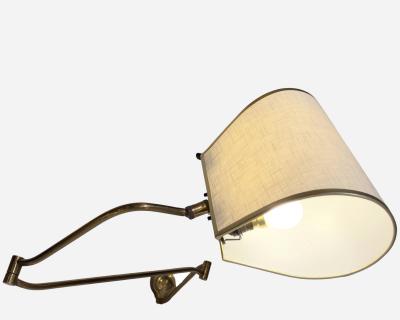 Rare folding wall light in solid brass France circa 1950