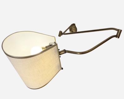 Rare folding wall light in solid brass France circa 1950
