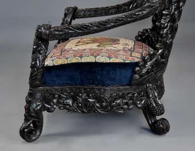 Rare highly decorative profusely carved 19thc Indian armchair