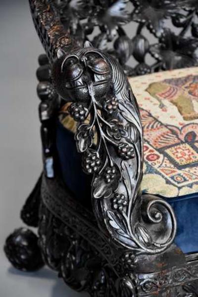 Rare highly decorative profusely carved 19thc Indian armchair