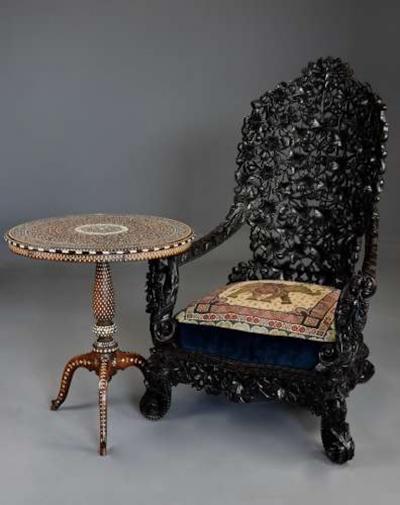 Rare highly decorative profusely carved 19thc Indian armchair