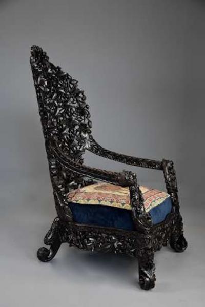 Rare highly decorative profusely carved 19thc Indian armchair