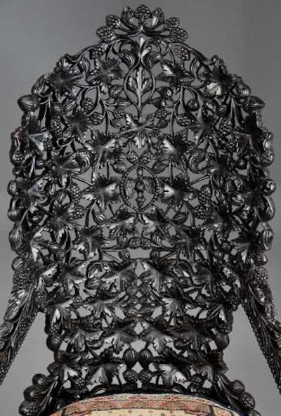 Rare highly decorative profusely carved 19thc Indian armchair