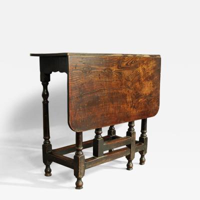 Rare late 17th century oak ash side table