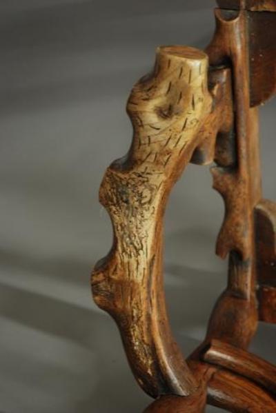 Rare mid 19th century carved elm armchair of naturalistic form