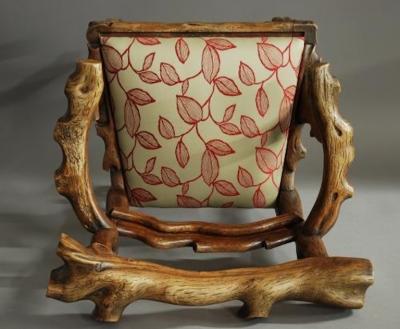 Rare mid 19th century carved elm armchair of naturalistic form