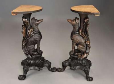Rare pair of finely carved Black Forest hound side tables