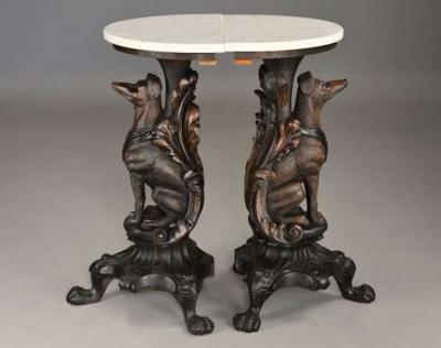 Rare pair of finely carved Black Forest hound side tables