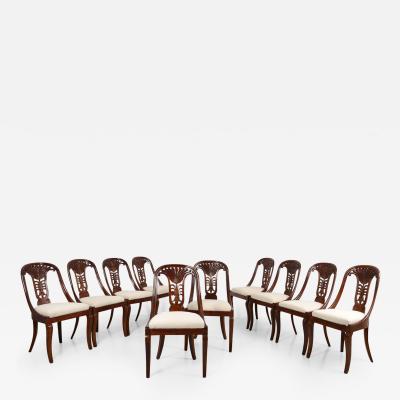 Rare set of 12 very refined dining chairs in walnut epoque Charles X