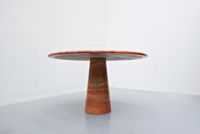 Red travertine dining table in style of Angelo Mangiarotti