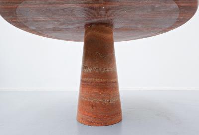 Red travertine dining table in style of Angelo Mangiarotti