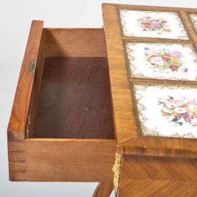 Regency Gilt Metal Mounted Tulipwood and Inlaid Porcelain Worktable