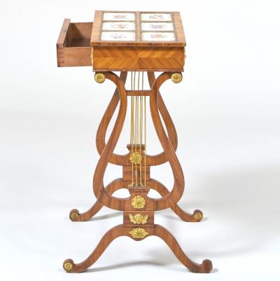 Regency Gilt Metal Mounted Tulipwood and Inlaid Porcelain Worktable